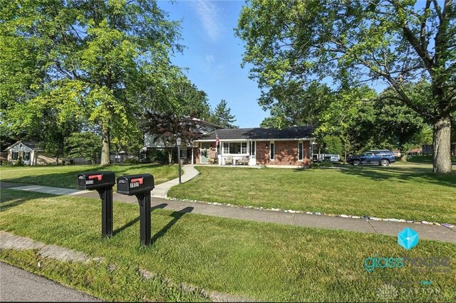 1937 Wilene Dr, Beavercreek, OH 45432 - view of front facade with a front yard