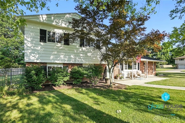 1937 Wilene Dr, Beavercreek, OH 45432 - rear view of property with brick siding and a patio