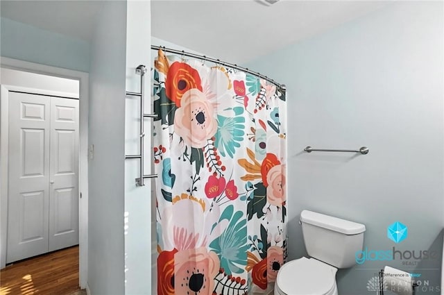 1937 Wilene Dr, Beavercreek, OH 45432 - bathroom featuring wood finished floors and a shower with curtain
