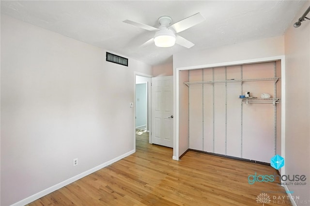 1937 Wilene Dr, Beavercreek, OH 45432 - unfurnished bedroom with light wood finished floors, a closet, and ceiling fan