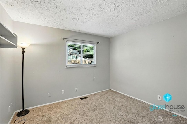1937 Wilene Dr, Beavercreek, OH 45432 - spare room featuring carpet floors and a textured ceiling