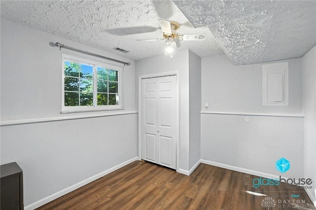 1937 Wilene Dr, Beavercreek, OH 45432 - unfurnished bedroom with wood finished floors, a closet, ceiling fan, and a textured ceiling