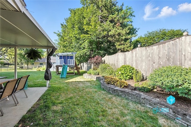 1937 Wilene Dr, Beavercreek, OH 45432 - view of yard featuring a playground and a patio area