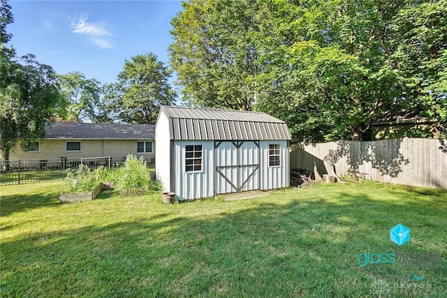 1937 Wilene Dr, Beavercreek, OH 45432 - view of shed featuring a fenced backyard and a garden