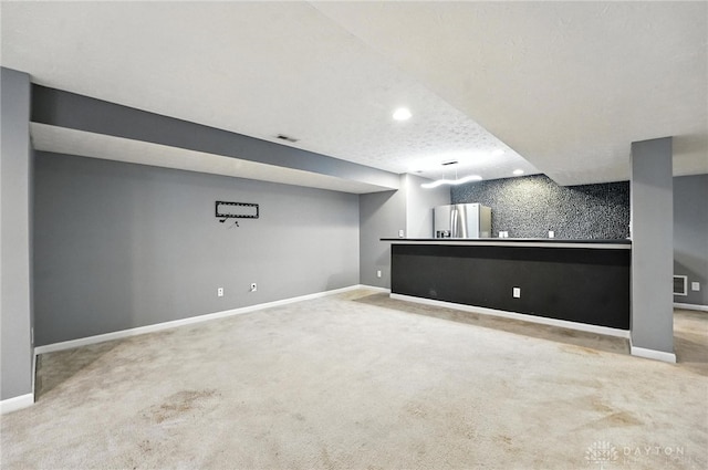 4300 Turtledove Way, Miamisburg, OH 45342 - finished basement featuring stainless steel fridge with ice dispenser, carpet floors, and recessed lighting