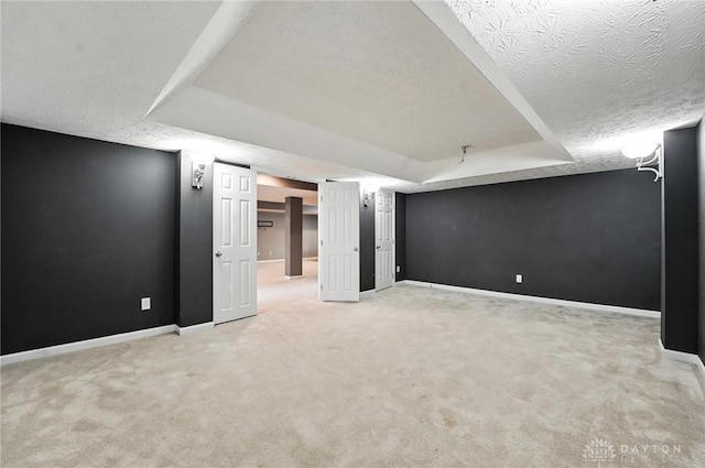 4300 Turtledove Way, Miamisburg, OH 45342 - empty room with a tray ceiling, a textured ceiling, and light colored carpet