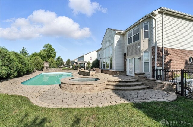 4300 Turtledove Way, Miamisburg, OH 45342 - view of swimming pool with a patio, an in-ground hot tub, and french doors