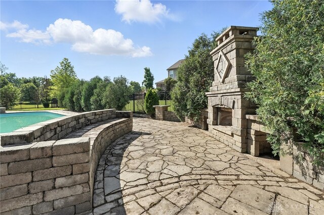 4300 Turtledove Way, Miamisburg, OH 45342 - view of patio with an outdoor stone fireplace