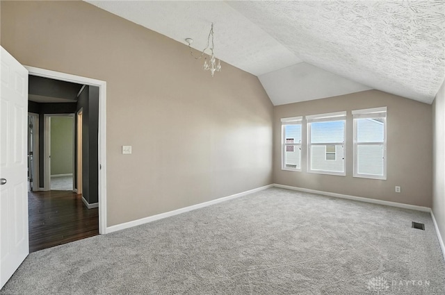 4300 Turtledove Way, Miamisburg, OH 45342 - bonus room with carpet, vaulted ceiling, and a textured ceiling