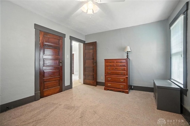 1551 W Main St, New Lebanon, OH 45345 - carpeted bedroom with baseboards and ceiling fan