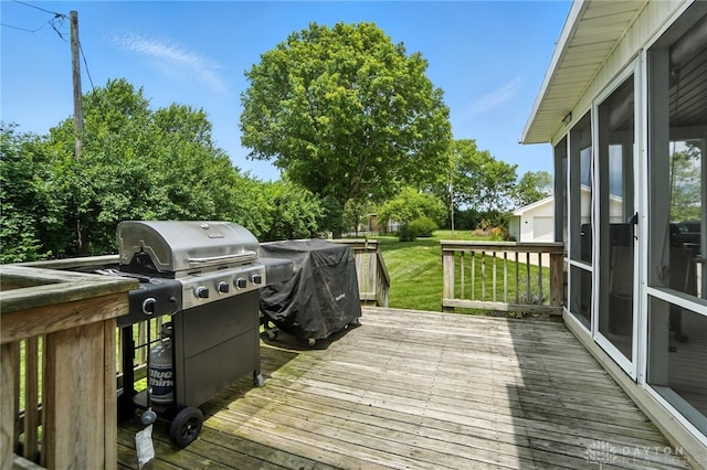 1551 W Main St, New Lebanon, OH 45345 - deck featuring a grill and a lawn