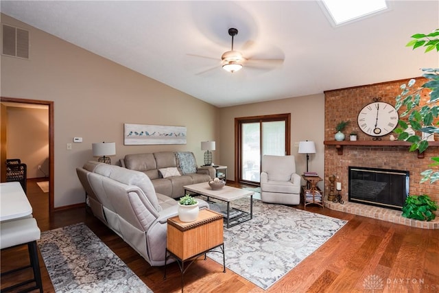 100 Timberwind Ln, Vandalia, OH 45377 - living room with lofted ceiling, ceiling fan, wood finished floors, and a fireplace