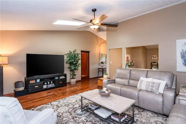 100 Timberwind Ln, Vandalia, OH 45377 - living area featuring a ceiling fan, lofted ceiling, and wood finished floors