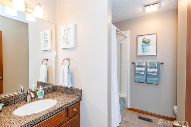 100 Timberwind Ln, Vandalia, OH 45377 - bathroom with vanity, tile patterned floors, and shower / bath combo