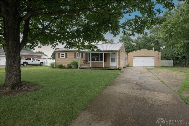 359 Gladys Ave, Franklin, OH 45005 - ranch-style house featuring a detached garage, an outbuilding, and a metal roof