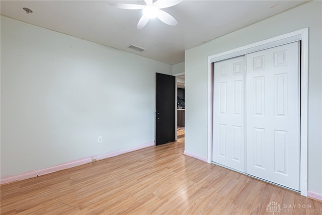 359 Gladys Ave, Franklin, OH 45005 - unfurnished bedroom with light wood-style floors, a closet, and ceiling fan
