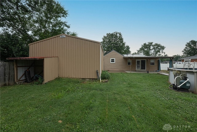 359 Gladys Ave, Franklin, OH 45005 - back of house featuring an outbuilding, an outdoor structure, and a patio area