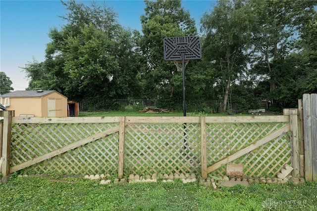 359 Gladys Ave, Franklin, OH 45005 - view of yard featuring a storage unit and view of wooded area