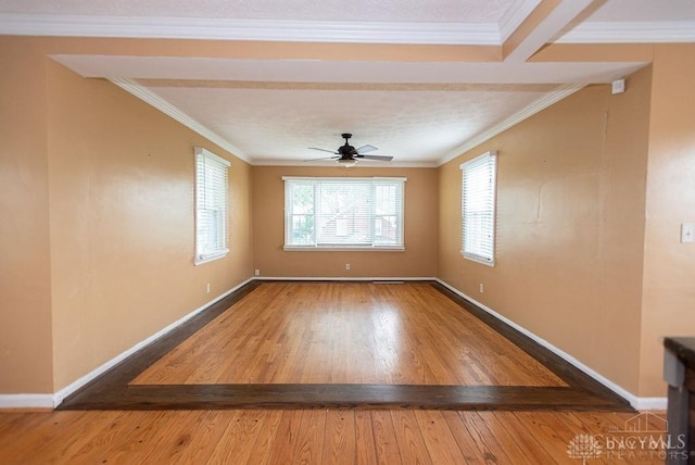 557 W N Bend Rd, Springfield Twp, OH 45224 - unfurnished room with wood finished floors, ceiling fan, and ornamental molding