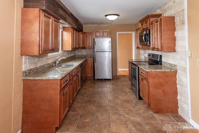557 W N Bend Rd, Springfield Twp, OH 45224 - kitchen featuring appliances with stainless steel finishes, brown cabinetry, and tasteful backsplash