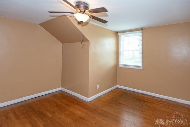 557 W N Bend Rd, Springfield Twp, OH 45224 - additional living space featuring ceiling fan, wood finished floors, and vaulted ceiling