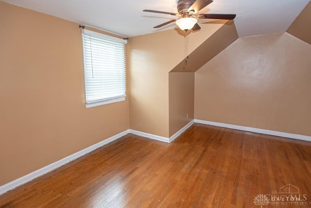 557 W N Bend Rd, Springfield Twp, OH 45224 - bonus room with wood finished floors, ceiling fan, and lofted ceiling