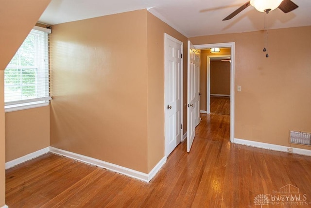557 W N Bend Rd, Springfield Twp, OH 45224 - hallway featuring baseboards and light wood-type flooring