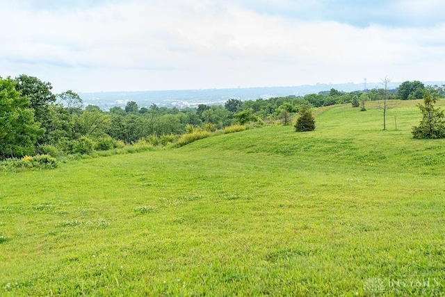 557 W N Bend Rd, Springfield Twp, OH 45224 - view of yard featuring a view of rural / pastoral area