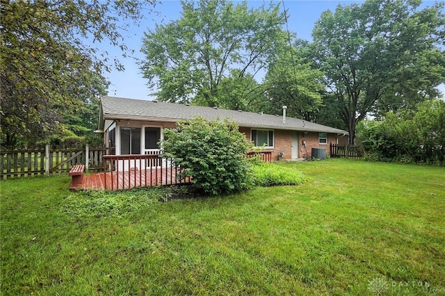 2184 Broadbent Way, Dayton, OH 45440 - back of property featuring a fenced backyard, a sunroom, and a deck