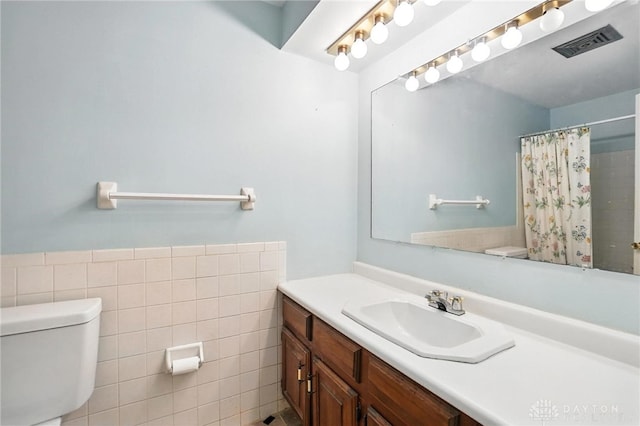 2184 Broadbent Way, Dayton, OH 45440 - full bathroom with vanity, tile walls, and a shower with shower curtain