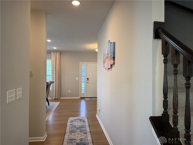 11916 Abbeytown Dr, Colerain Twp, OH 45251 - hallway featuring dark wood-style flooring, stairway, and recessed lighting