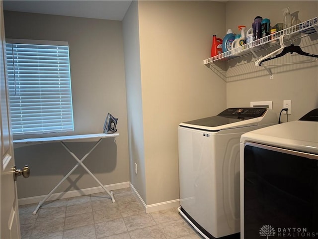 11916 Abbeytown Dr, Colerain Twp, OH 45251 - laundry area with separate washer and dryer and baseboards