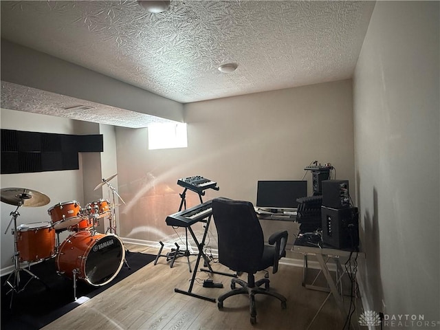 11916 Abbeytown Dr, Colerain Twp, OH 45251 - home office with a textured ceiling and wood finished floors
