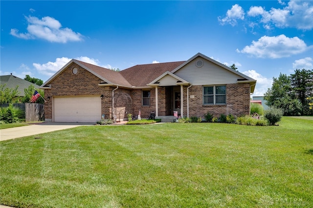 215 Christina Way, Franklin, OH 45005 - view of front facade with an attached garage, brick siding, and driveway