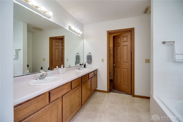 215 Christina Way, Franklin, OH 45005 - full bath featuring double vanity and a bath