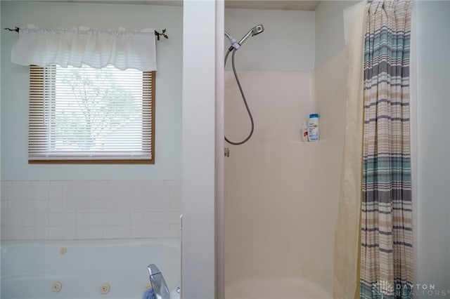 215 Christina Way, Franklin, OH 45005 - bathroom featuring a shower stall and a tub with jets