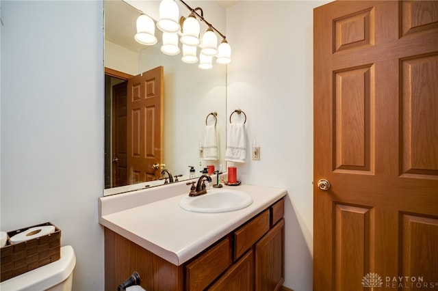 215 Christina Way, Franklin, OH 45005 - half bathroom featuring vanity and toilet