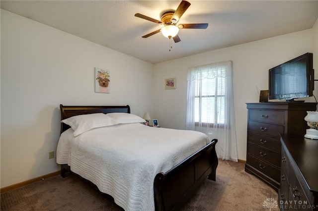 215 Christina Way, Franklin, OH 45005 - carpeted bedroom featuring baseboards and a ceiling fan