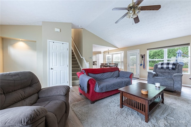 947 Stone Ridge Ln, Lebanon, OH 45036 - living area with wood finished floors, stairs, healthy amount of natural light, vaulted ceiling, and a ceiling fan