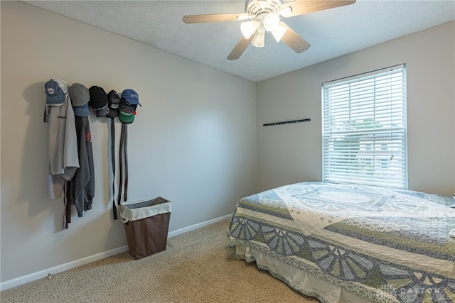 947 Stone Ridge Ln, Lebanon, OH 45036 - bedroom featuring light colored carpet, ceiling fan, and a textured ceiling