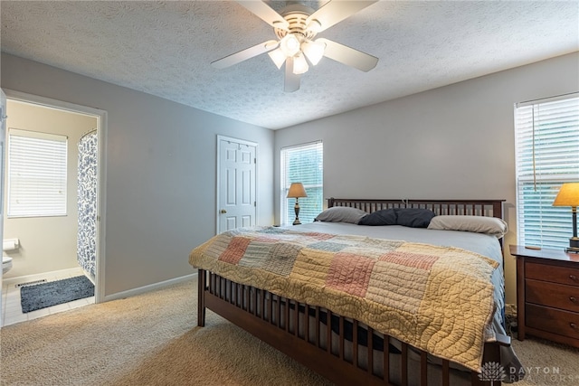 947 Stone Ridge Ln, Lebanon, OH 45036 - bedroom featuring light colored carpet, a textured ceiling, connected bathroom, ceiling fan, and a closet