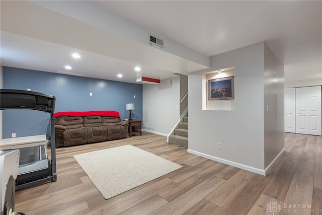 947 Stone Ridge Ln, Lebanon, OH 45036 - living area featuring light wood-style flooring, stairs, and recessed lighting