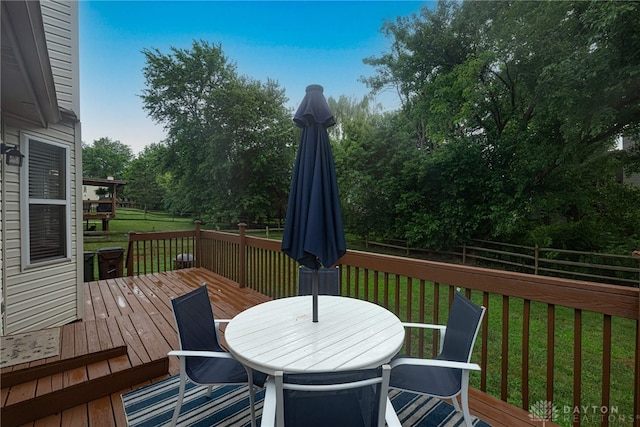 947 Stone Ridge Ln, Lebanon, OH 45036 - deck featuring a fenced backyard, outdoor dining space, and view of scattered trees