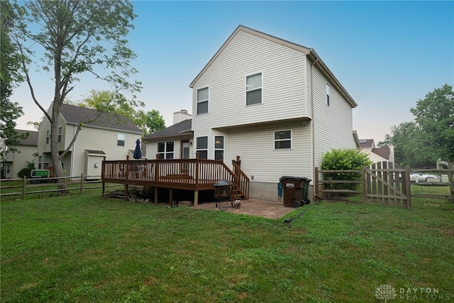 947 Stone Ridge Ln, Lebanon, OH 45036 - rear view of house with a deck, a fenced backyard, and a patio