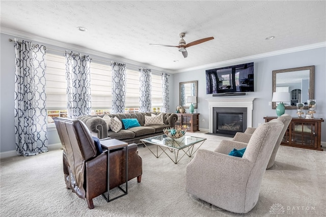 9282 Maple Brook St, Clearcreek Twp, OH 45458 - living area featuring carpet flooring, crown molding, ceiling fan, a fireplace with flush hearth, and a textured ceiling