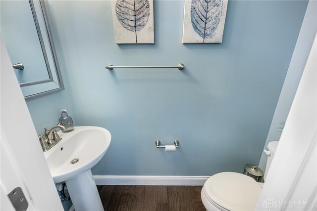 9282 Maple Brook St, Clearcreek Twp, OH 45458 - half bath featuring toilet and wood finished floors