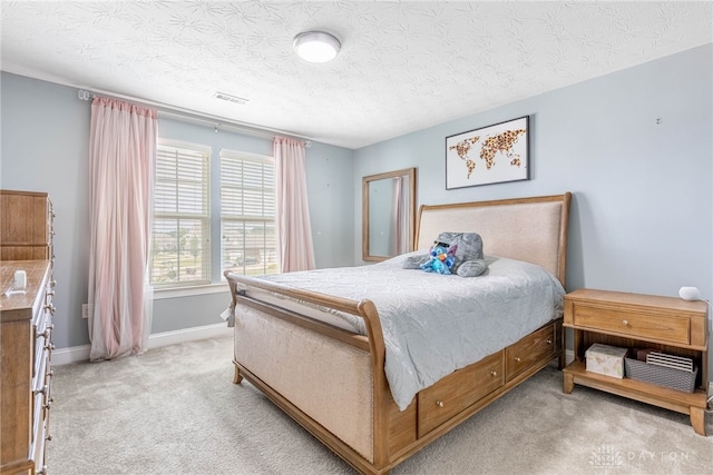 9282 Maple Brook St, Clearcreek Twp, OH 45458 - bedroom featuring light carpet and a textured ceiling