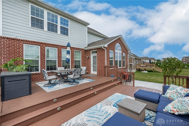 9282 Maple Brook St, Clearcreek Twp, OH 45458 - wooden deck featuring an outdoor living space and outdoor dining area
