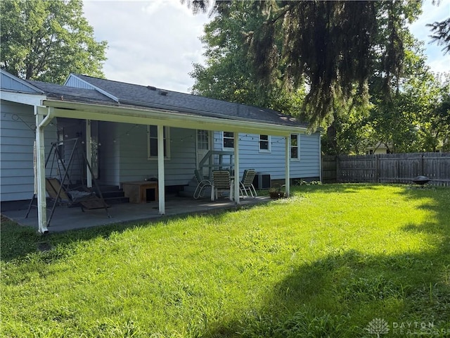 5001 Central Ave, Middletown, OH 45044 - back of house with a patio area, entry steps, and roof with shingles