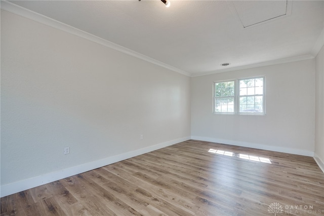 3183 Myers Tillman Rd, Arcanum, OH 45304 - spare room featuring crown molding and wood finished floors
